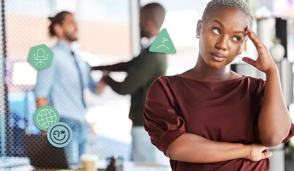 Collaboratrice excédée par une situation de tensions professionnelles en arrière-plan