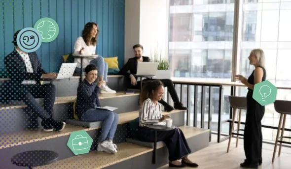 Équipe en atelier de coaching collectif créant un mind-map sur un tableau blanc.