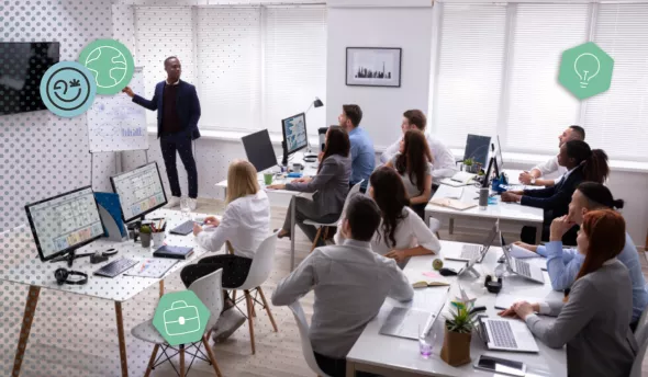 Collaborateurs en train de suivre une formation