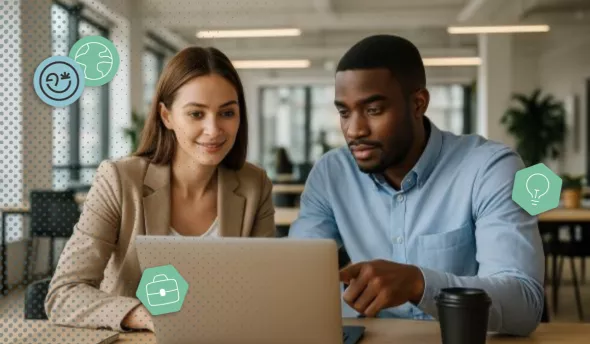 Des collaborateurs aux expertises variées co-construisent un projet autour d’un mur de post-it, illustrant l’intelligence collective et la créativité générées par le travail collaboratif.