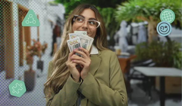 Employé au bureau comptant des billets, symbole du salaire comme moteur de motivation