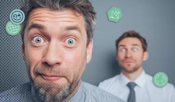 Portrait d’un collaborateur surpris avec un collègue flou en arrière-plan dans un bureau