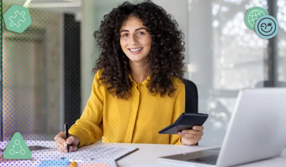 Comptable data analyst analysant des données financières sur tablette et ordinateur