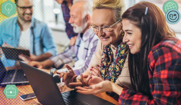 Femme bénévole aidant une plus jeune dans la transmission de savoir