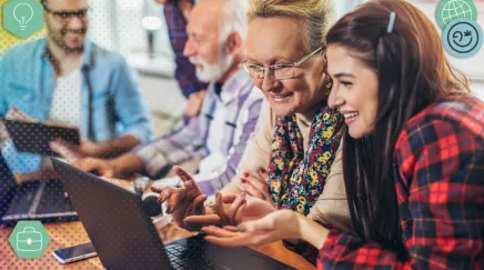Femme bénévole aidant une plus jeune dans la transmission de savoir